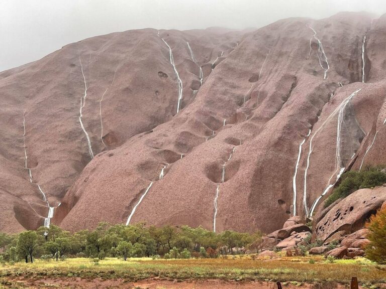 Heavy Rain Brought Spectacular Waterfalls to Australia’s Most Famous Rock